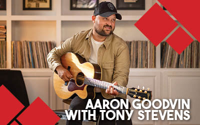 Aaron Goodvin with Tony Stevens event artwork from Ticketpro and DCC Shell Theatre